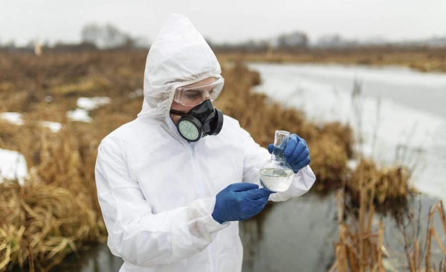 scientist-wearing-protective-suit-medium-shot